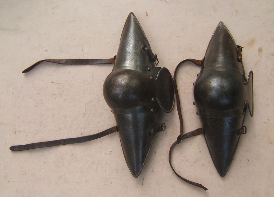 A FINE PAIR OF VICTORIAN ERA COPIES OF 15th CENTURY ARCHER'S KNEE DEFENSES of, ca. 1450 (ca.1890) front