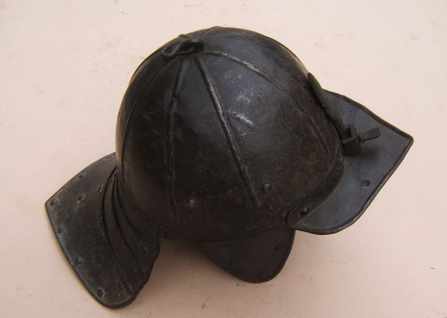 A VERY GOOD UNTOUCHED THIRTY YEARS WAR/ENGLISH CIVIL WAR PERIOD ENGLISH/DUTCH LOBSTER-TAIL POT HELMET, ca. 1620
