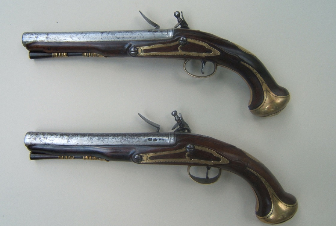 A FINE PAIR OF FRENCH & INDIAN/AMERICAN REVOLUTIONARY WAR PERIOD ENGLISH FLINTLOCK OFFICER'S PISTOLS, by