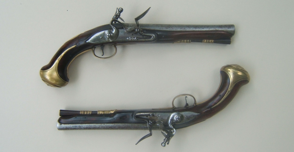 A FINE PAIR OF FRENCH & INDIAN/AMERICAN REVOLUTIONARY WAR PERIOD ENGLISH FLINTLOCK OFFICER'S PISTOLS, by