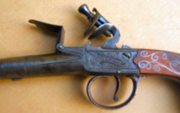 A FINE PAIR OF REVOLUTIONARY WAR PERIOD SILVER-WIRE-INLAY ENGLISH FLINTLOCK TURN-OFF HAND-WARMER (MUFF)/TRAVELLING PISTOLS, ca. 1775 view 3