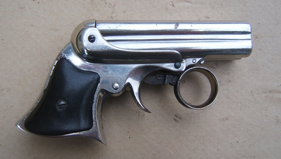 AN EXCELLENT & RARE EBONY GRIP REMINGTON ELLIOT’S FOUR BARREL .32 cal. RING-TRIGGER DERRINGER, ca. 1865