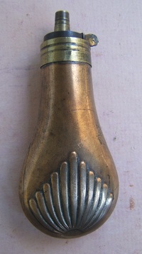 A FINE 19th CENTURY SMALL-SIZED (PISTOL-TYPE) EMBOSSED COPPER POWDER FLASK, ca. 1850 view 2