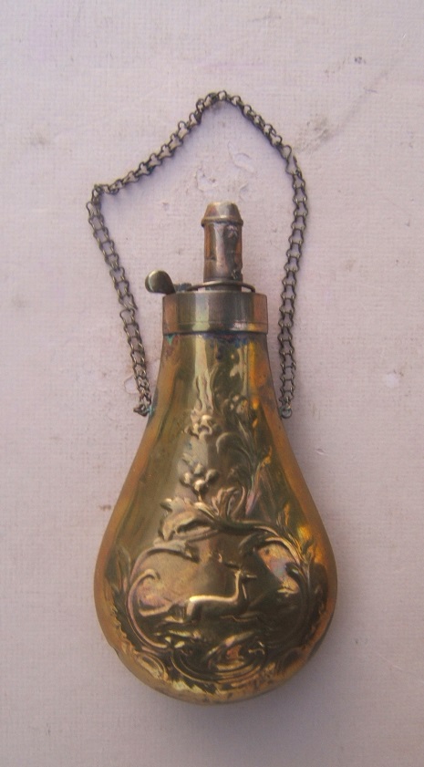 A VERY GOOD EMBOSSED MID-19TH CENTURY BRASS POWDER FLASK, ca. 1860 view 1