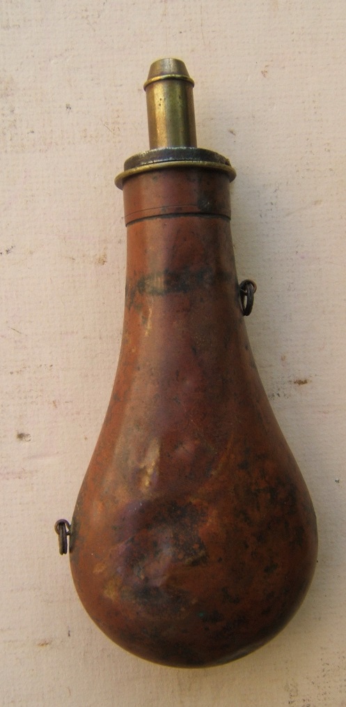 A VERY GOOD QUALITY MID-19th CENTURY AMERICAN EMBOSSED COPPER POWDER FLASK, ca. 1850 view 1