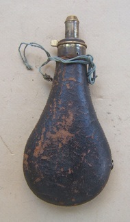 An Untouched Mid-19th Century American Leather Covered Metal Powder Flask, ca. 1860 view 1