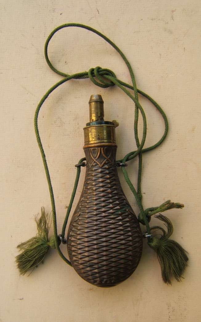 A FINE MID-19th CENTURY EMBOSSED COPPER POWDER FLASK, ca. 1850 view 1