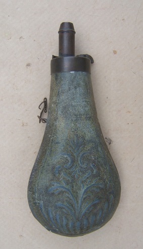 AN EMBOSSED ZINC MID-19th CENTURY POWDER FLASK, ca. 1860 view 1