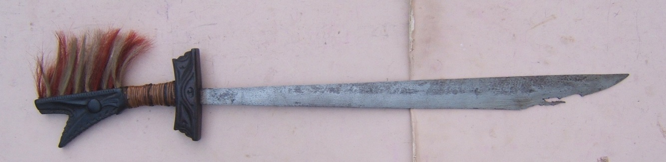 A FINE ORIGINAL 19TH CENTURY PHILIPPINE HEADHUNTER'S MANDAU SWORD, ca. 1880 view1