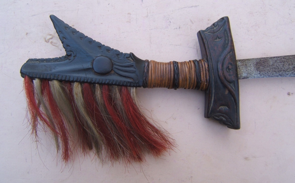 A FINE ORIGINAL 19TH CENTURY PHILIPPINE HEADHUNTER'S MANDAU SWORD, ca. 1880 view3