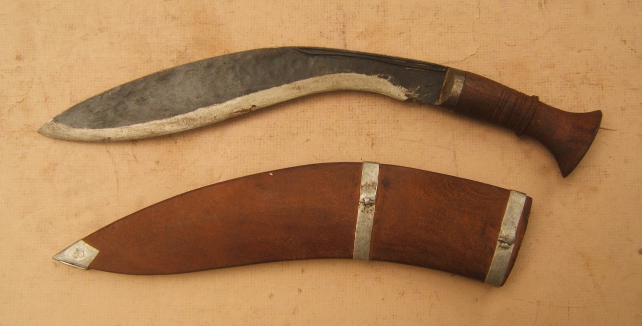 A 20TH CENTURY INDIAN KUKRI KNIFE w/ CARVED WOODEN SCABBARD, ca. 1950 view1
