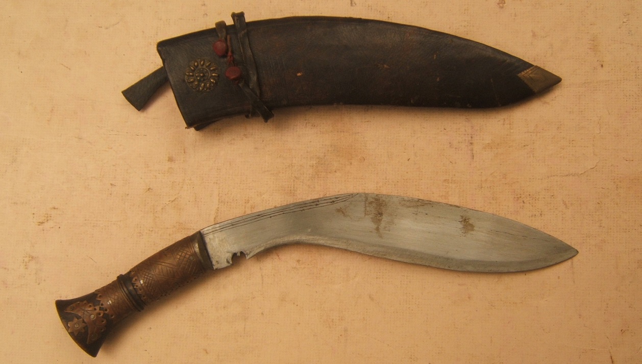 A VERY GOOD LATE 19th/20th CENTURY INDIAN KUKRI (KNIFE) & LEATHER SCABBARD w/ SHARPENER, ca. 1900 view1