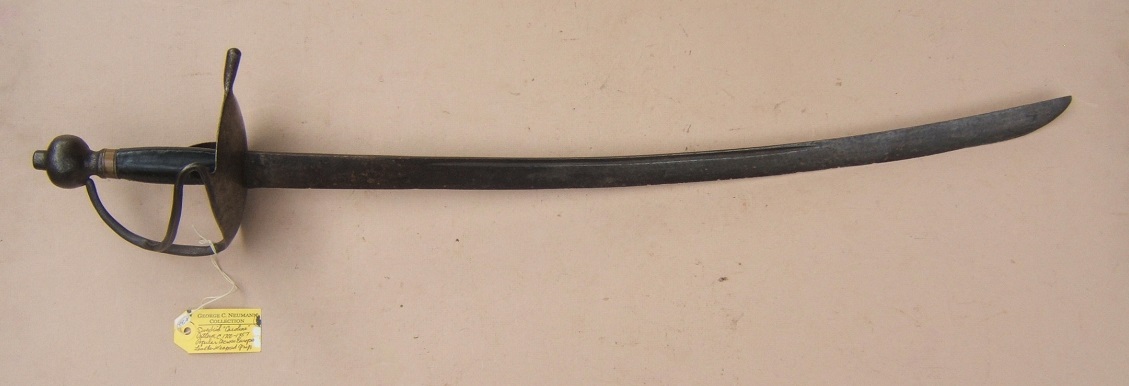 A FINE EARLY COLONIAL PERIOD NORTHERN EUROPEAN CAROLINE TYPE HANGER/CUTLASS, ca. 1720: Ex. GEORGE C. NEUMANN COLLECTION & PICTURED IN BATTLE WEAPONS OF THE AMERICAN REVOLUTION view 1