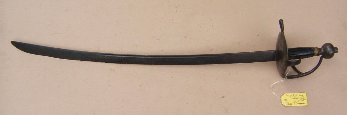 A FINE EARLY COLONIAL PERIOD NORTHERN EUROPEAN CAROLINE TYPE HANGER/CUTLASS, ca. 1720: Ex. GEORGE C. NEUMANN COLLECTION & PICTURED IN BATTLE WEAPONS OF THE AMERICAN REVOLUTION view 2