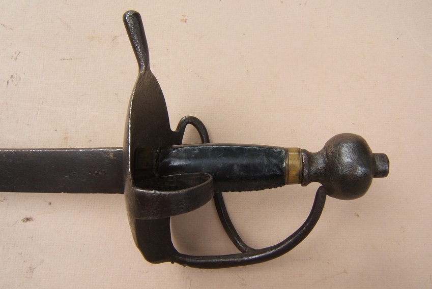 A FINE EARLY COLONIAL PERIOD NORTHERN EUROPEAN “CAROLINE” TYPE HANGER/CUTLASS, ca. 1720: Ex. GEORGE C. NEUMANN COLLECTION & PICTURED IN “BATTLE WEAPONS OF THE AMERICAN REVOLUTION” view 3