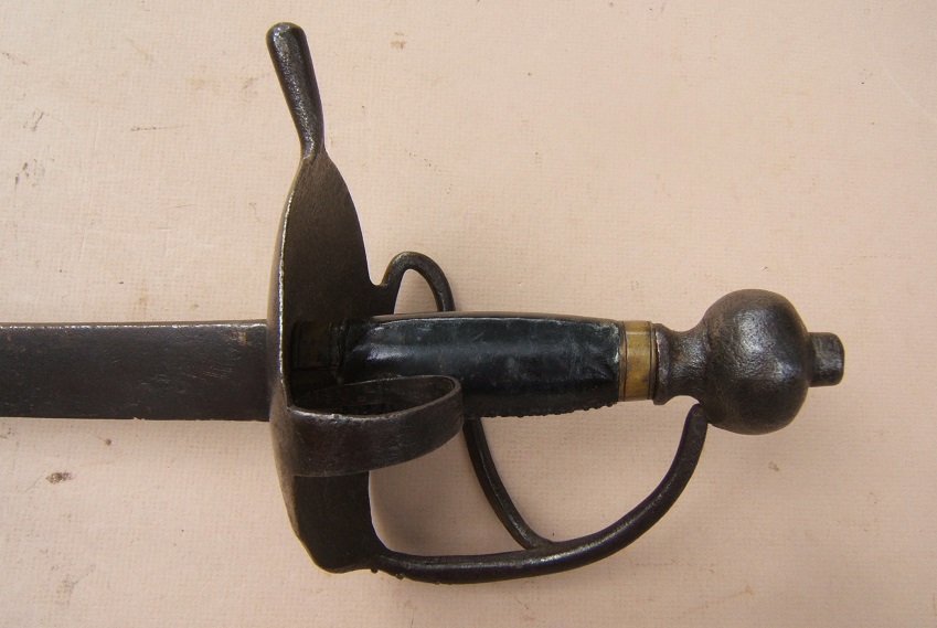 A FINE EARLY COLONIAL PERIOD NORTHERN EUROPEAN CAROLINE TYPE HANGER/CUTLASS, ca. 1720: Ex. GEORGE C. NEUMANN COLLECTION & PICTURED IN BATTLE WEAPONS OF THE AMERICAN REVOLUTION view 3