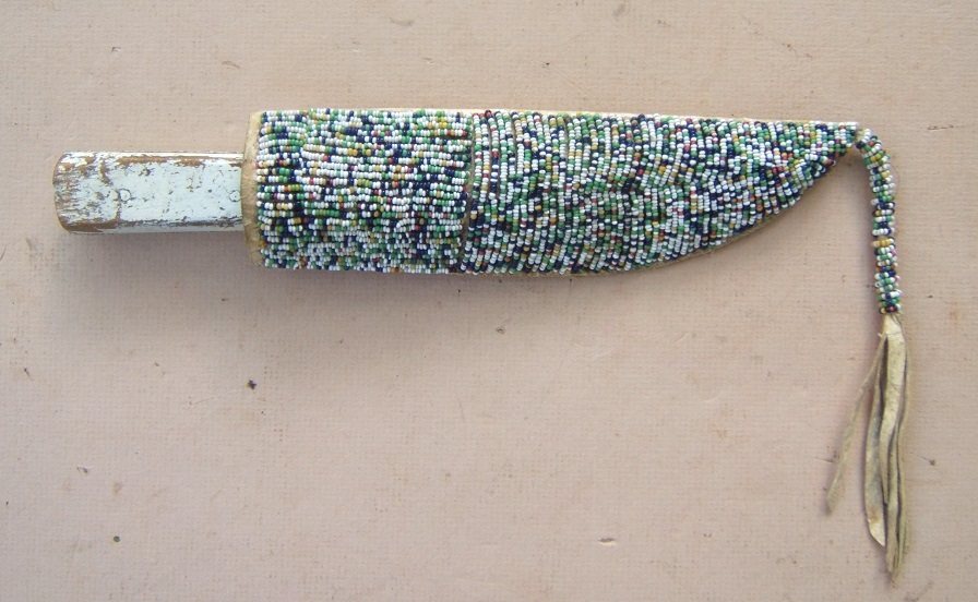  A FINE TRADE-BEAD DECORATED MID-19TH CENTURY AMERICAN PLAINS INDIAN (SIOUX) BUFFALO SKINNING TRADE-KNIFE & SCABBARD, ca. 1870 view 2